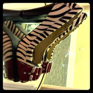 Peep toe zebra print pumps